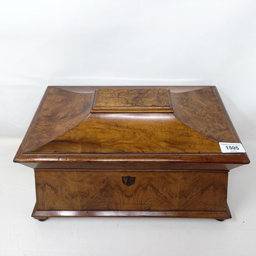 1595 - A 19th century walnut tea caddy, the hinge top to reveal marquetry inlaid caddies, and a later cut g... 