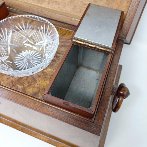 1595 - A 19th century walnut tea caddy, the hinge top to reveal marquetry inlaid caddies, and a later cut g... 