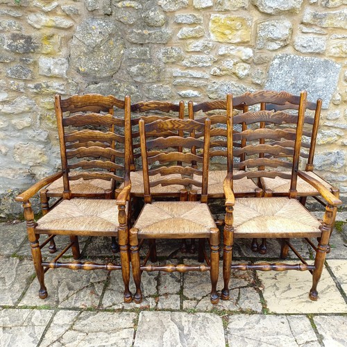 1631 - A set of eight Titchmarsh & Goodwin style oak ladder back dining chairs, with reeded seats (6+2)