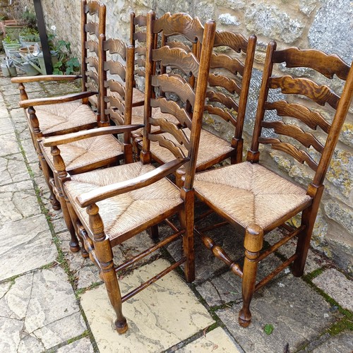 1631 - A set of eight Titchmarsh & Goodwin style oak ladder back dining chairs, with reeded seats (6+2)