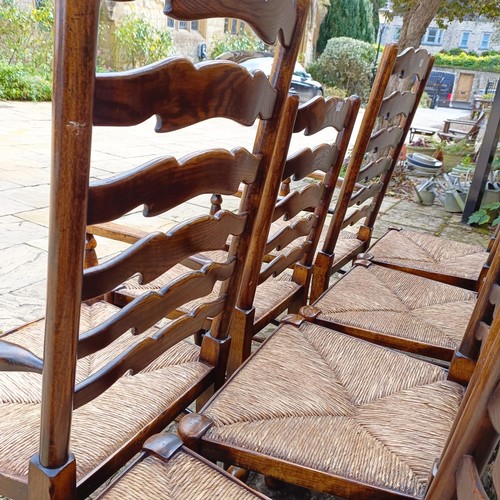 1631 - A set of eight Titchmarsh & Goodwin style oak ladder back dining chairs, with reeded seats (6+2)