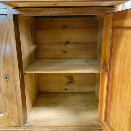 1625 - A mahogany cupboard, with a single drawer, above two cupboard doors, 45 cm wide, and a trolley (2)