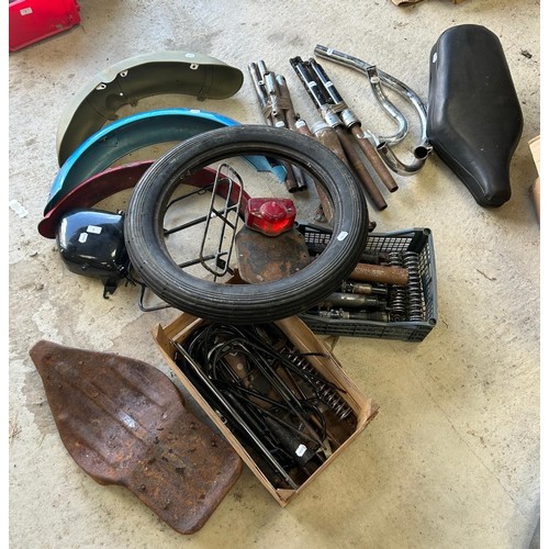 8 - Three mud guards, a seat, mud guard stays, and other assorted items (qty)...