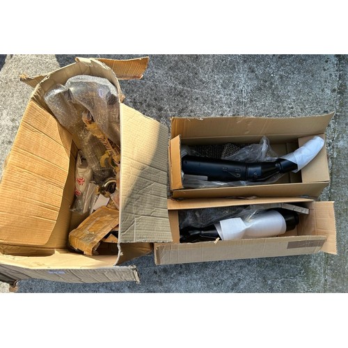 28 - A pair of Honda new old stock silencers, and other Honda new old stock parts...