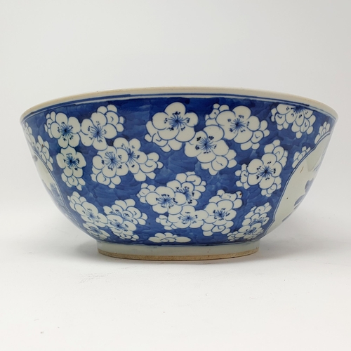 62 - A Chinese blue and white bowl, decorated birds, 30 cm diameter