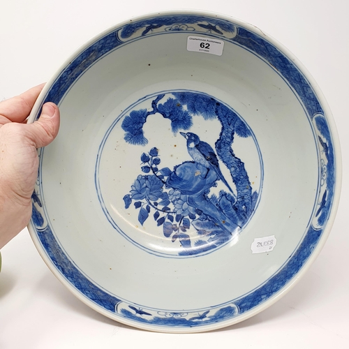 62 - A Chinese blue and white bowl, decorated birds, 30 cm diameter