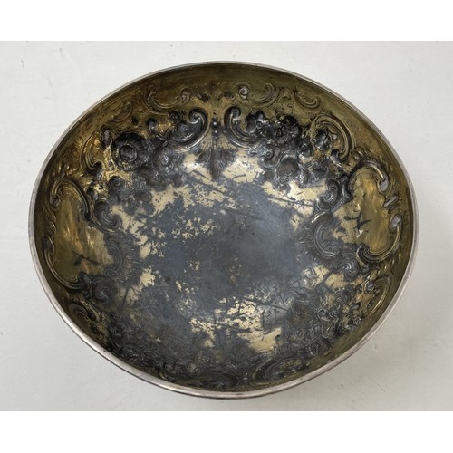 1075 - A Victorian silver bowl, with embossed decoration, marks rubbed, 11.3 ozt,