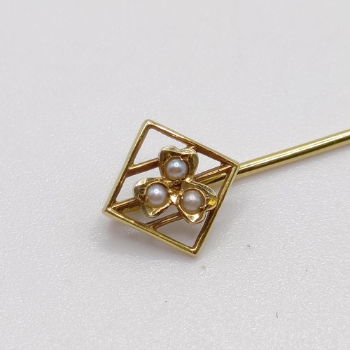 603 - An Art Deco style 14ct gold and seed pearl stick pin  Provenance:  From a single owner collection of... 