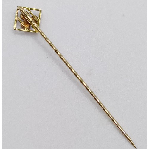 603 - An Art Deco style 14ct gold and seed pearl stick pin  Provenance:  From a single owner collection of... 