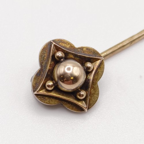 602 - A late 19th/early 20th century yellow metal stick pin   Provenance:  From a single owner collection ... 