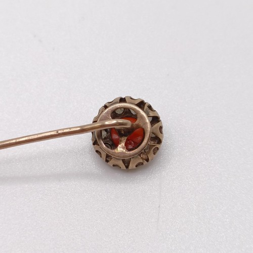 600 - A late 19th/early 20th century yellow metal, coral and seed pearl stick pin Provenance:  From a sing... 