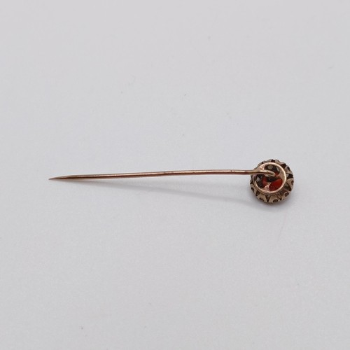 600 - A late 19th/early 20th century yellow metal, coral and seed pearl stick pin Provenance:  From a sing... 