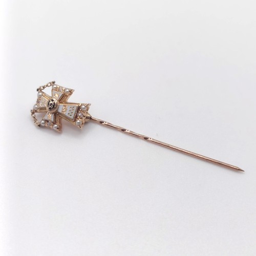 590 - An early 20th century white enamel, seed pearl and diamond stick pin, with the back engaved  Provena... 