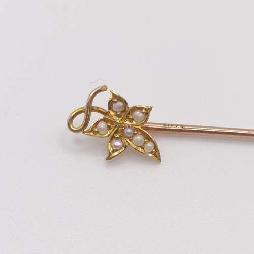 586 - A late 19th/early 20th century yellow metal and seed pearl stick pin, in the form of a leaf Provenan... 