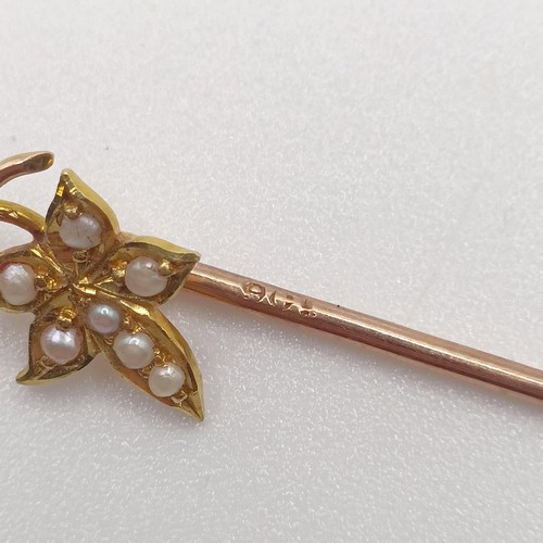 586 - A late 19th/early 20th century yellow metal and seed pearl stick pin, in the form of a leaf Provenan... 