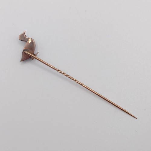 578 - A late 19th/early 20th century yellow metal, diamond and shell stick pin, in the form of a duck  Pro... 