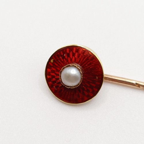 574 - An early 20th century yellow metal, pearl and red enamel stick pin Provenance:  From a single owner ... 