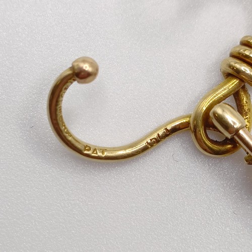 572 - A late 19th/early 20th century yellow metal and pearl stick pin, in the form of a noose  Provenance:... 