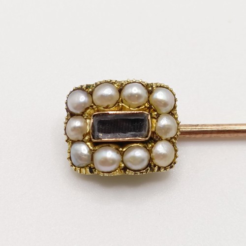 571 - A 19th century yellow coloured metal and pearl memorial stick pin  Provenance:  From a single owner ... 