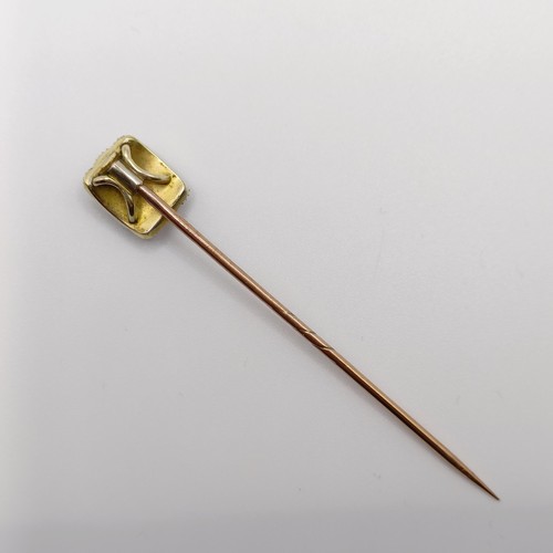 571 - A 19th century yellow coloured metal and pearl memorial stick pin  Provenance:  From a single owner ... 