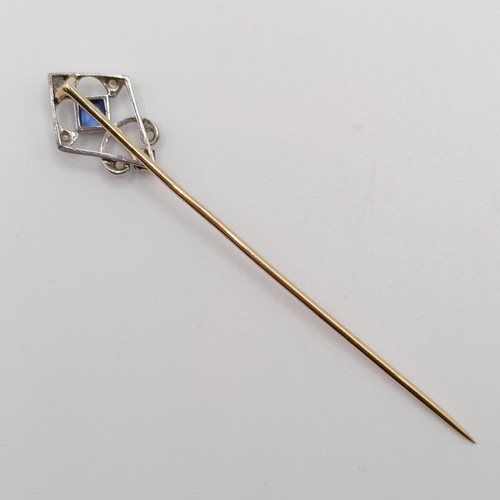 570 - A silver coloured metal, yellow metal, sapphire and diamond stick pin  Provenance:  From a single ow... 