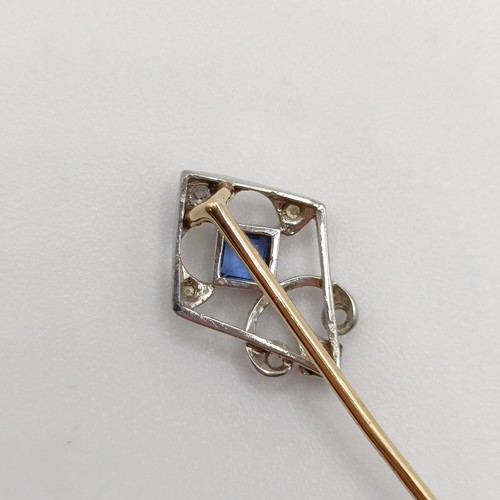 570 - A silver coloured metal, yellow metal, sapphire and diamond stick pin  Provenance:  From a single ow... 