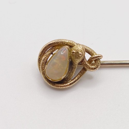 544 - A late 19th/early 20th century yellow metal and opal stick pin, in the form of a snake Provenance:  ... 