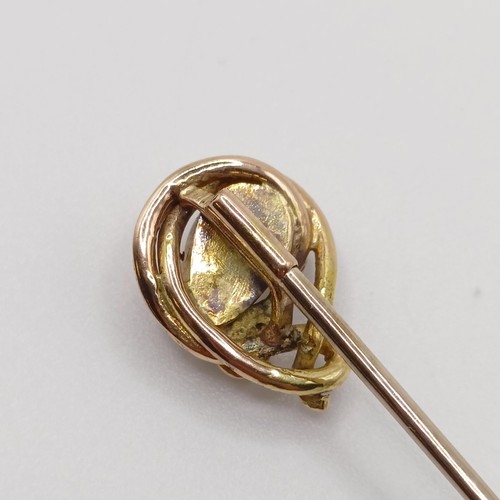 544 - A late 19th/early 20th century yellow metal and opal stick pin, in the form of a snake Provenance:  ... 