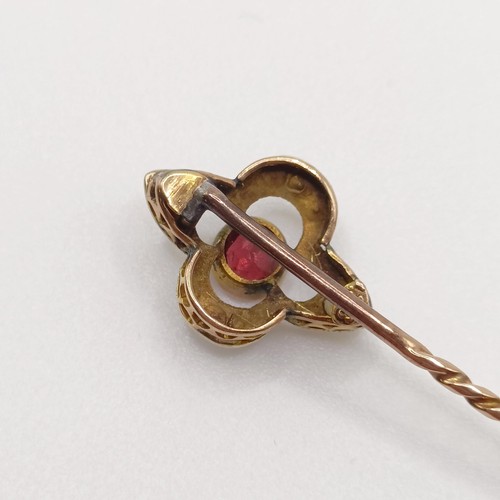 541 - A late 19th/early 20th century yellow metal, garnet and seed pearl stick pin  Provenance:  From a si... 