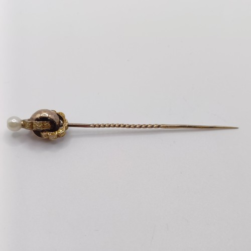 539 - A late 19th/early 20th century yellow metal and cultured pearl stick pin  Provenance:  From a single... 