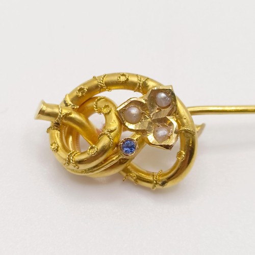 538 - A late 19th/early 20th century yellow metal, sapphire and seed pearl stick pin  Provenance:  From a ... 