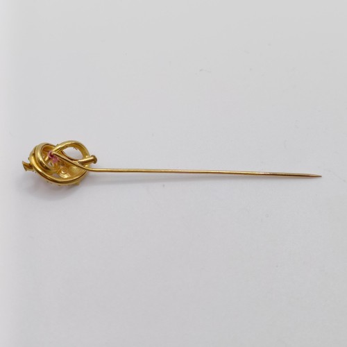 538 - A late 19th/early 20th century yellow metal, sapphire and seed pearl stick pin  Provenance:  From a ... 