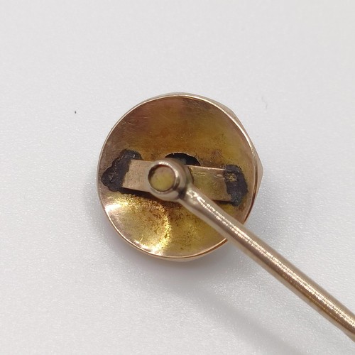 535 - A late 19th/early 20th century yellow metal, seed pearl and tiger's eye stick pin  Provenance:  From... 