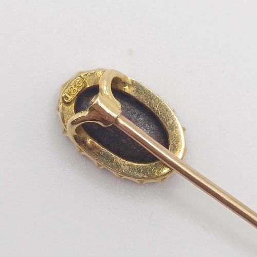 533 - A 20th century, yellow coloured metal and opal stick pin  Provenance:  From a single owner collectio... 