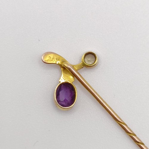 531 - A late 19th/early 20th century yellow metal, amethyst and peridot stick pin Provenance:  From a sing... 