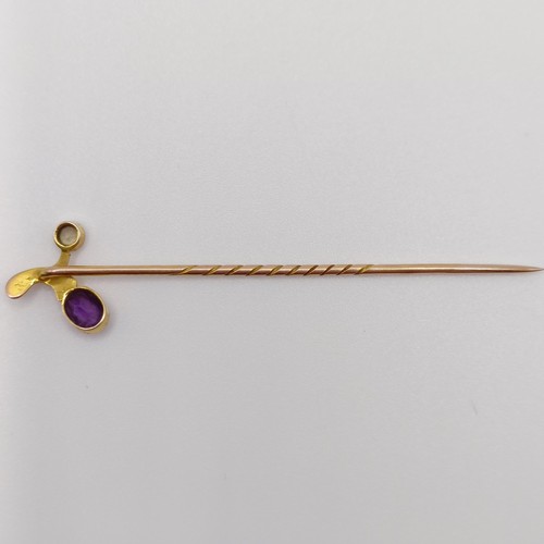 531 - A late 19th/early 20th century yellow metal, amethyst and peridot stick pin Provenance:  From a sing... 