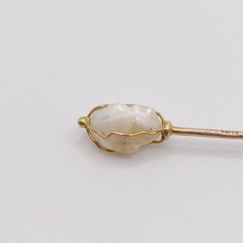 529 - A yellow metal and cultured pearl stick pin  Provenance:  From a single owner collection of Victoria... 