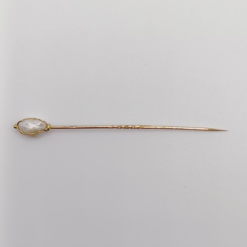 529 - A yellow metal and cultured pearl stick pin  Provenance:  From a single owner collection of Victoria... 