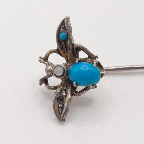 524 - A silver coloured metal, turquoise and seed pearl stick pin, in the form of a fly  Provenance:  From... 