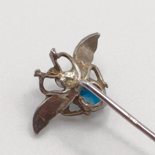 524 - A silver coloured metal, turquoise and seed pearl stick pin, in the form of a fly  Provenance:  From... 