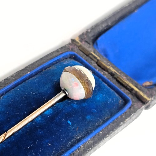 516 - An early 20th century opal and white stone stick pin, in a vintage jewellery box   Provenance:  From... 