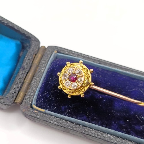 511 - A late 19th/early 20th century ruby and diamond stick pin, in a vintage jewellery box  Provenance:  ... 