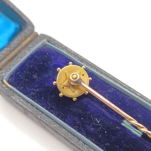 511 - A late 19th/early 20th century ruby and diamond stick pin, in a vintage jewellery box  Provenance:  ... 