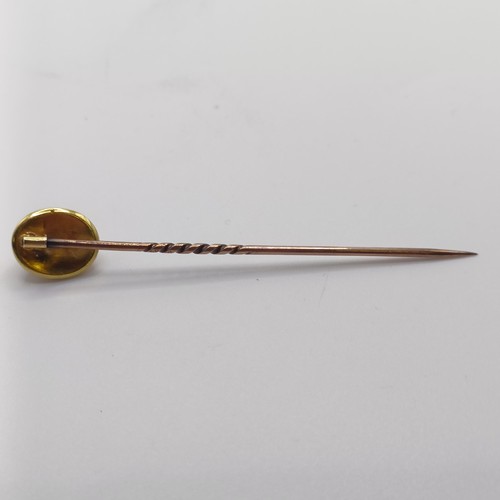 507 - A 19th century cabochon cut garnet stick pin, in a vintage jewellery box  Provenance:  From a single... 