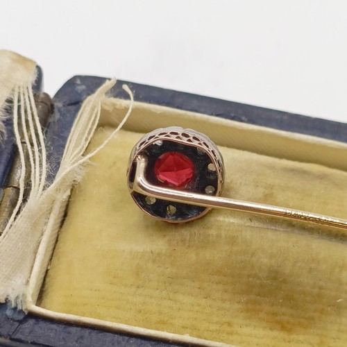 506 - A late 19th/early 20th century red and white stone stick pin, in a vintage jewellery box  Provenance... 