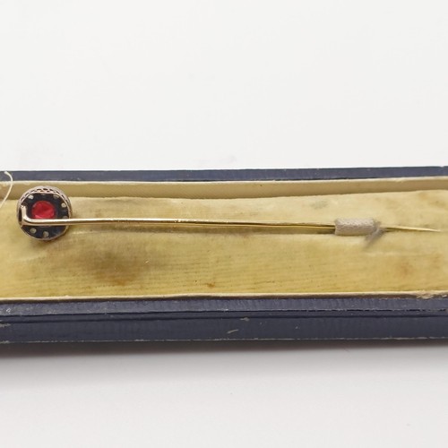 506 - A late 19th/early 20th century red and white stone stick pin, in a vintage jewellery box  Provenance... 