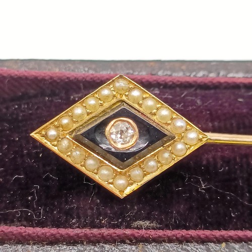 503 - A late 19th/early 20th century diamond, seed pearl and black stone stick pin, in a vintage jewellery... 