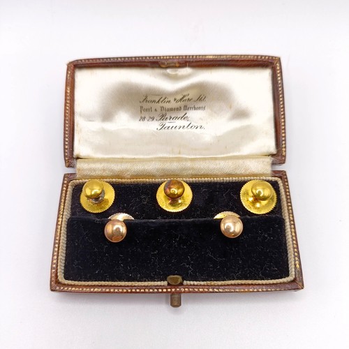 663 - A set of five 9ct gold buttons, in a vintage jewellery case
Provenance:  From a single owner collect... 