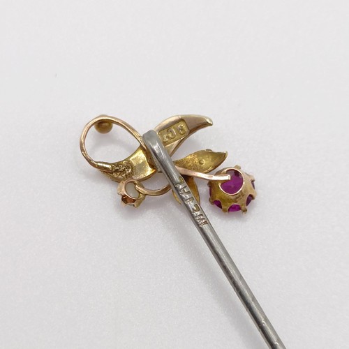 634 - A late 19th/early 20th century silver coloured metal, yellow coloured metal, purple stone and seed p... 