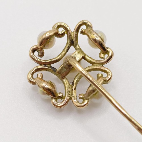 631 - A late 19th/early 20th century yellow metal and pearl stick pin  Provenance:  From a single owner co... 